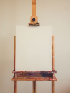 easel photo by Justyn Warner on Unsplash pastel dust 9 practical ways to deal with it