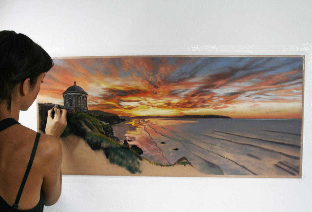 Grey 8 in use: Emma Colbert, "Fiery Skies at Mussenden" in progress, soft pastel on Velour, 40 x 18in