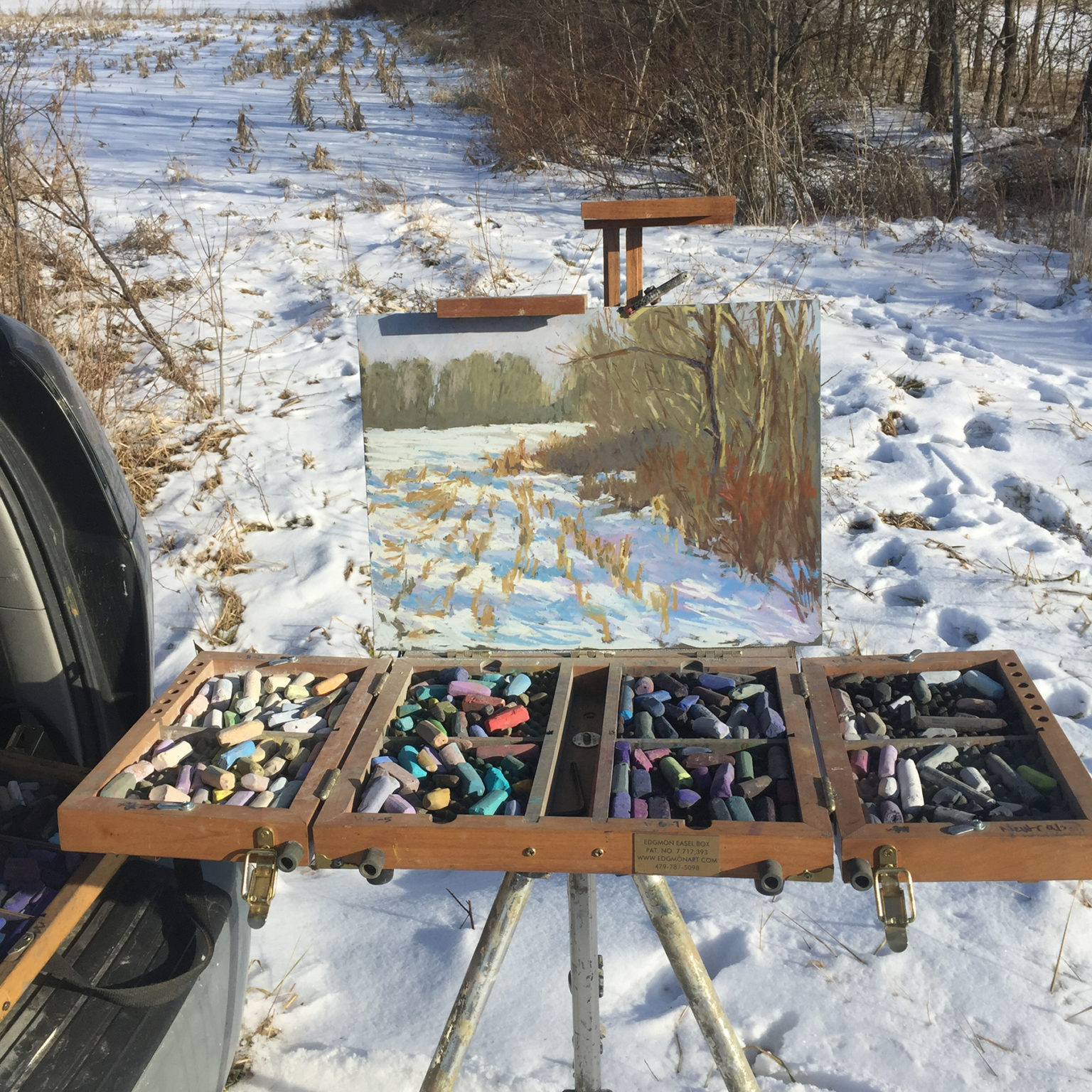 Set up for Carol Strock Wasson's Cornfield in Snow, 2018, pastel, 12 x 16 in